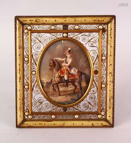 A GOOD 19TH CENTURY PAINTED IVORY MINIATURE IN TORTOISESHELL & PEARL FILIGREE FRAME, the painting of