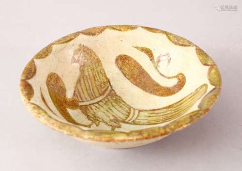 A GOOD ISLAMIC ABBASID POTTERY BOWL, with a light glaze decorated with birds, 14cm.