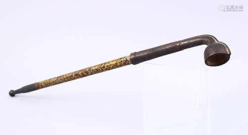 A LARGE CHINESE METAL AND GILT OPIUM PIPE, with gilt decoration through the cental section 47cm.