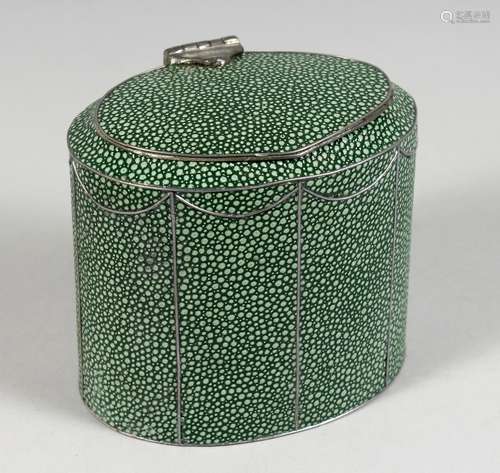 A GEORGE III DESIGN SHAGREEN OVAL TEA CADDY. 4ins high.