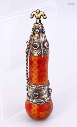 A 19TH CENTURY TURKMAN SILVER MOUNTED POWDER FLASK, inset with semi precious stones, 15cm long