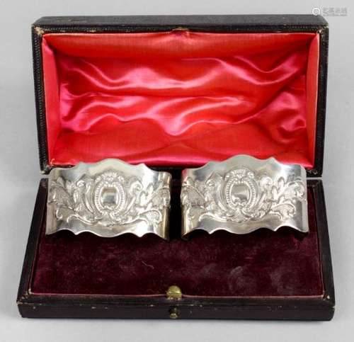 A pair of Victorian silver napkin rings,