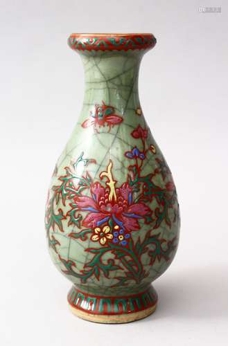 A LATE 19TH CENTURY CHINESE PORCELAIN CELADON VASE WITH FAMILLE ROSE DECORATION, the body with