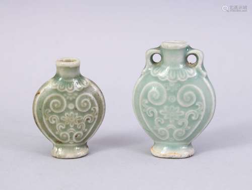 TWO CHINESE CELADON GLAZED PORCELAIN SNUFF BOTTLES, 4.5 & 5.5CM.