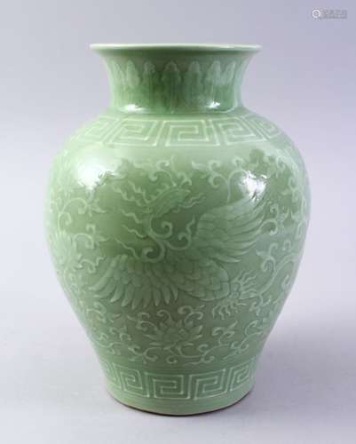 A GOOD CHINESE MING STYLE CELADON PORCELAIN VASE, the body decorated with carved lotus and geometric