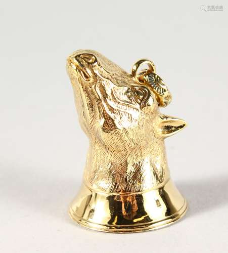 A GOLD PLATED HORSE SEAL.