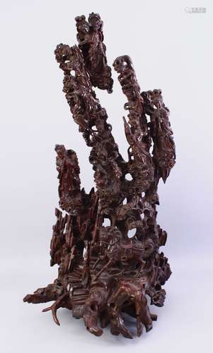 A GOOD QUALITY LARGE 19TH CENTURY CHINESE CARVED IMMORTAL ROOTWOOD FIGURE, the sculpture well carved