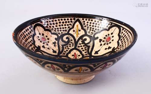 A GOOD ISLAMIC SIGNED POTTERY BOWL - SAFI, the interior decorated with formal floral design, the