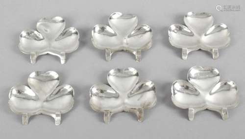 A set of six Edwardian silver menu or place card holders, each modelled as a three-leaf clover.