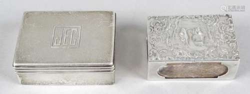 A selection of silver novelty items,