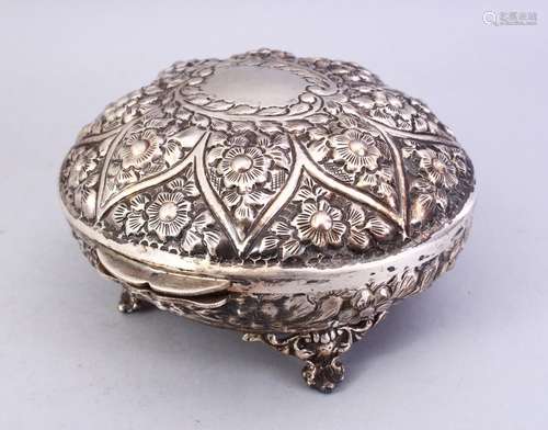 A GOOD 19TH CENTURY ISLAMIC SILVER LIDDED BOX, the box stood on four feet, with a hinged lid, floral