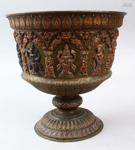 A 19TH CENTURY INDIAN TANJORE SILVER & COPPER OVERLAID BRASS JARDINIERE, with moulded god