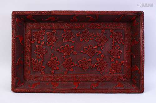 A GOOD 19TH CENTURY CHINESE CINNABAR LACQUER CARVED TRAY, the tray carved in relief to depict bats