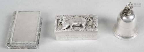 A silver pill box,