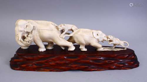 A GOOD JAPANESE MEIJI PERIOD CARVED IVORY ELEPHANT & TIGER OKIMONO, the okimono carved to depict the