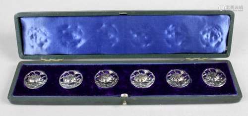 A cased set of six Edwardian silver buttons,