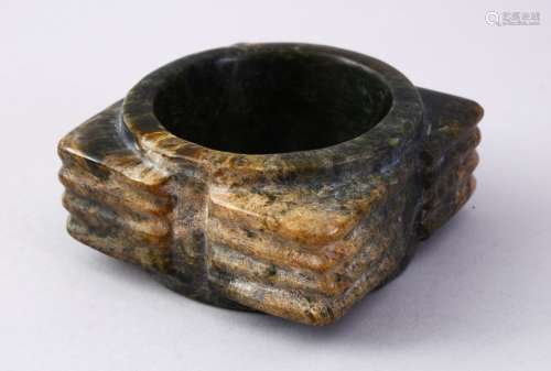 A GOOD CHINESE CARVED JADE CONG SECTION, with a ribbed body and cylindrical centre, 8.5cm square.
