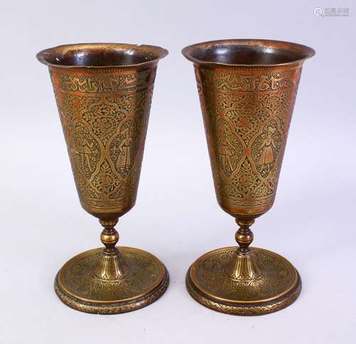 A GOOD PAIR OF ENGLISH MADE ISLAMIC MARKET BRASS GOBLETS, with calligraphy and panels of figures,