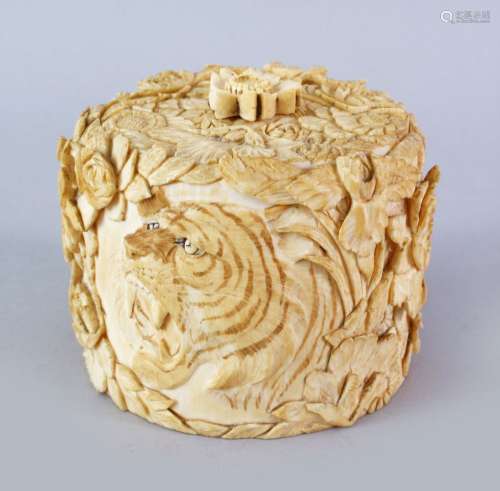 A GOOD JAPANESE MEIJI PERIOD CARVED IVORY TIGER LIDDED BOX, the box carved in relied to depict