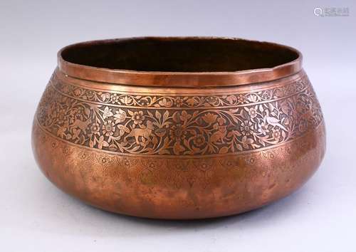 A GOOD QAJAR COPPER BOWL, decorated with flora and animals, 34cm diameter.