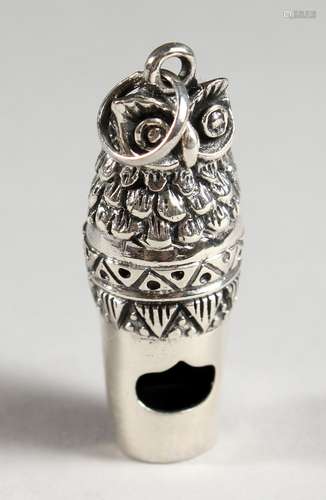 A SILVER OWL WHISTLE. 1.75ins long.