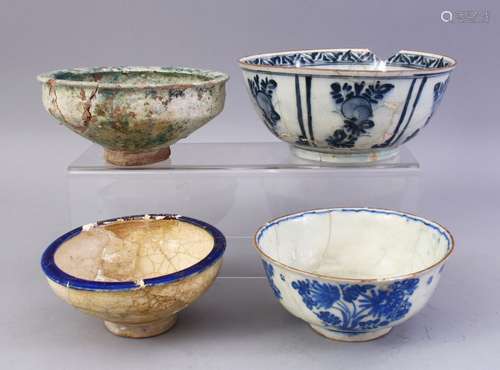 FOUR VARIOUS PERSIAN GLAZED POTTERY BOWLS, largest 19cm diameter.