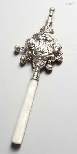 A SILVER RATTLE, with mother-of-pearl handle. 7ins long.