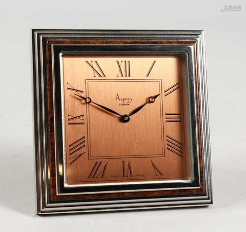 A GOOD ASPREY OF LONDON SWISS MADE SQUARE EASEL CLOCK, with brass dial, No. 2680. 4ins square.