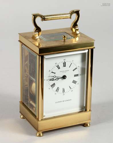 A GOOD TAYLOR & BLIGH, ENGLAND, LLOYDS OF LONDON BRASS FRENCH STYLE CARRIAGE CLOCK, eleven jewels,