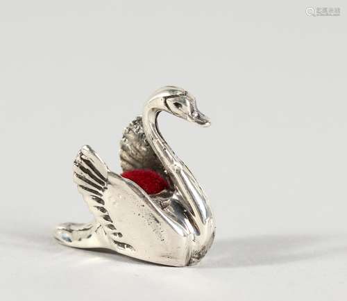 A MINIATURE SILVER SWAN PIN CUSHION. 0.75ins high.