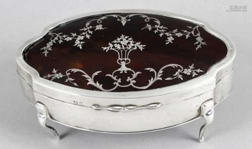 A George V silver mounted and tortoiseshell box,