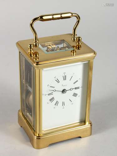 A GOOD ASPREY OF LONDON BRASS FRENCH CARRIAGE CLOCK, made in England, with eleven jewels, white