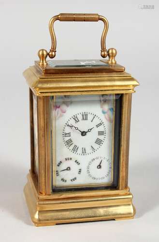 A SMALL SEVRES TYPE BRASS CARRIAGE CLOCK. 3ins high.