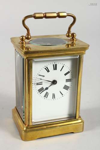 A 19TH CENTURY FRENCH BRASS CARRIAGE CLOCK TIMEPIECE. 4.5ins high.