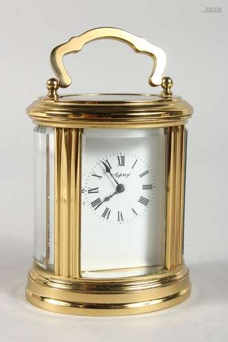 A VERY GOOD SMALL ASPREY FRENCH OVAL CARRIAGE CLOCK, with white dial, black Roman numerals and