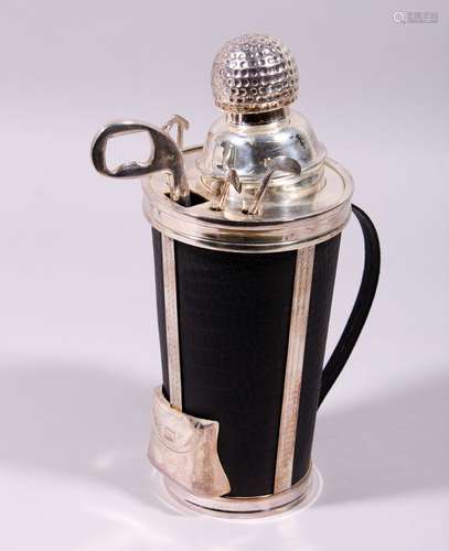 A LARGE SILVER PLATE AND LEATHER GOLFING COCKTAIL SHAKER.