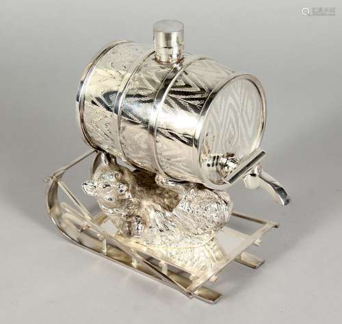 A PLATED SPIRIT DISPENSER, modelled as a bear on a sleigh, holding a barrel. 8.5ins long.