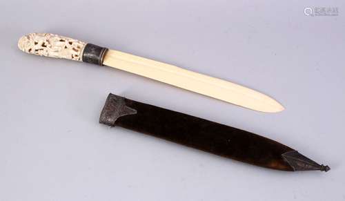 A FINE 19TH CENTURY BURMESE IVORY AND SILVER MOUNTED PAGE TURNER, with carved and pierced handle and