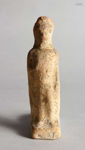 A HELLENISTIC TERRACOTTA FIGURAL VOTIVE. 4.5ins high.