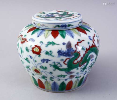 A GOOD CHINESE DOUCAI DECORATED PORCELAIN GINGER JAR, the body decorated with scenes of dragins