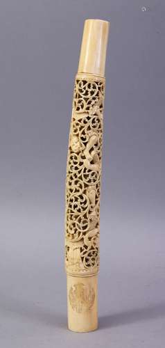 A FINE 19TH CENTURY BURMESE IVORY DHA SWORD HANDLE, carved and pierced with entwined figures, 29cm