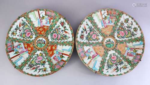 A GOOD PAIR OF 19TH CENTURY CHINESE CANTON FAMILLE ROSE PORCELAIN DISHES, decorated with panels