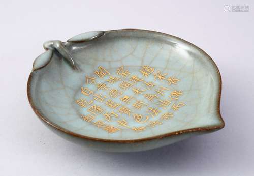 AN UNUSUAL CHINESE PEACH SHAPED CALLIGRAPHIC RU WARE DISH, the body in the form of a peach and