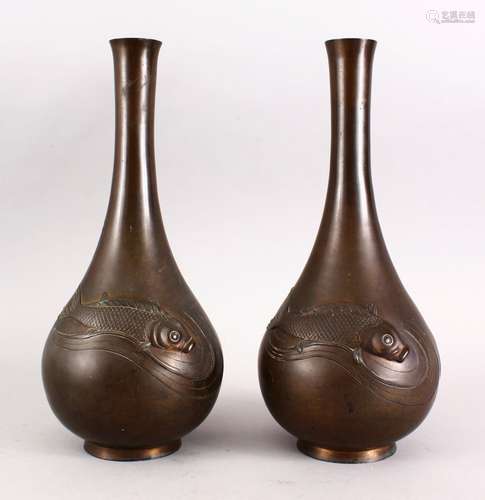 A GOOD PAIR OF JAPANESE MEIJI PERIOD BRONZE RELIEF CARP VASES, the body of both bottle shaped