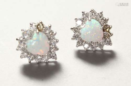 A PAIR OF SILVER AND OPAL EARRINGS.