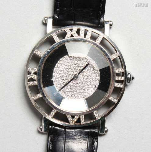 A MOUSSAIEFF ROMAN 18CT WHITE GOLD AND DIAMOND WRISTWATCH, diamond numerals and face, with leather