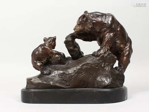 RUSSE A BRONZE GROUP, BEAR MOTHER AND CUB, on a rocky base. Signed. 11ins long.