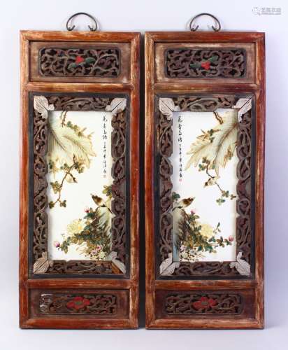 A PAIR OF CHINESE REPUBLIC STYLE FAMILLE VERTE PORCELAIN PANELS IN FRAMES, depicting scenes of birds