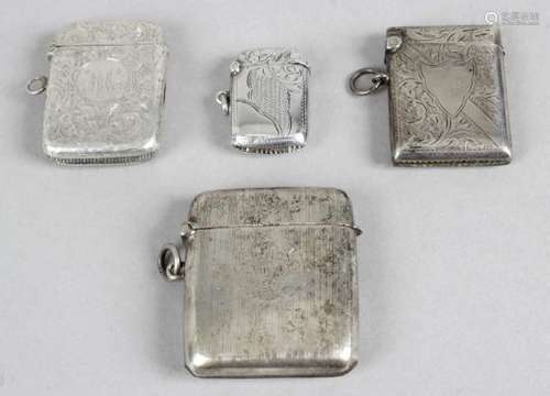 Four silver vesta cases,