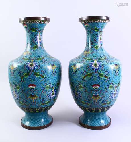 A LARGE PAIR OF 19TH CENTURY CHINESE CLOISOINNE VASES, each decorated upon a blue ground ith